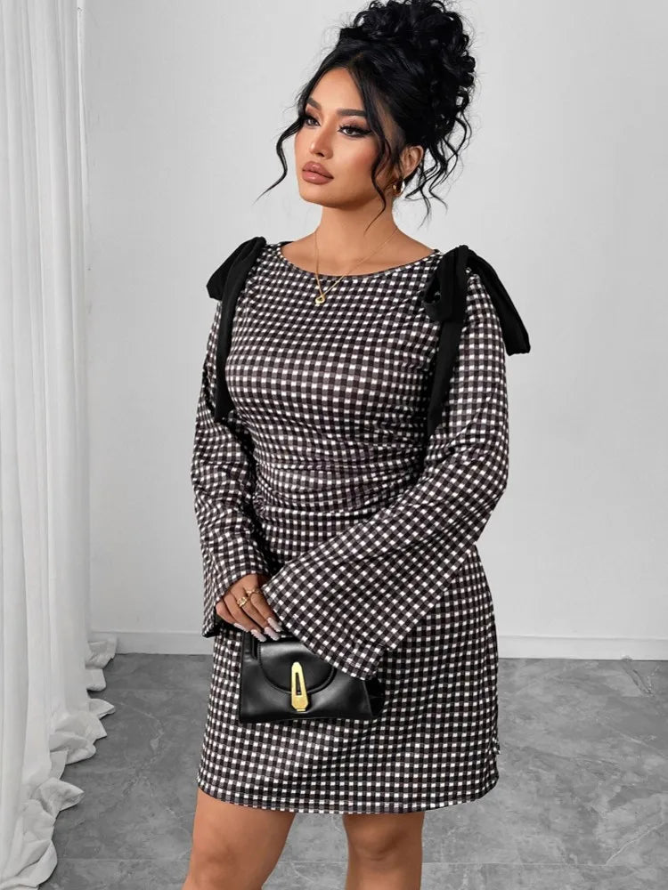 Kresima women's grid print slim fit pencil dress with o-neck and long sleeves, displayed on a model showing the dress details