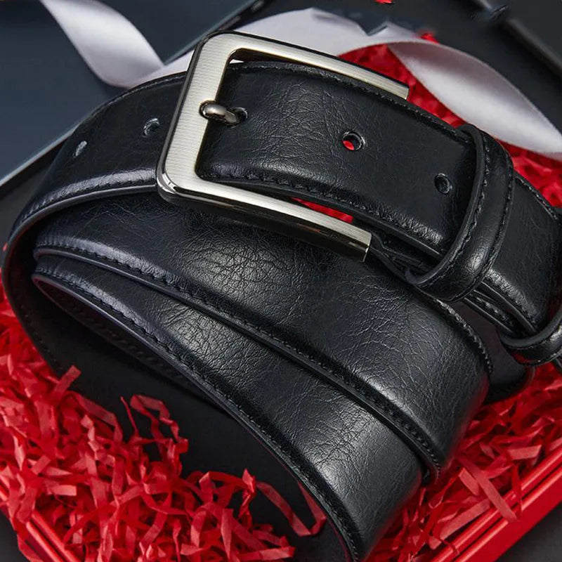 Men's genuine split leather belt with alloy needle buckle by Showlu Fashion, showing the belt's texture and buckle detail.