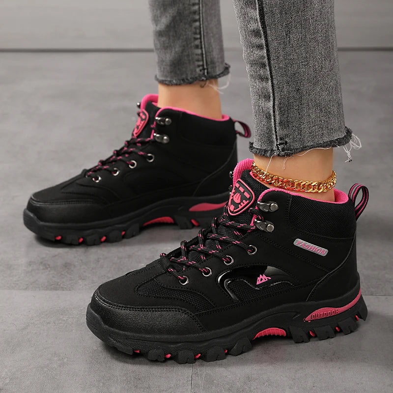 Women's waterproof hiking boots and safety work shoes with non-slip soles, ankle design, suitable for outdoor walking and hiking.