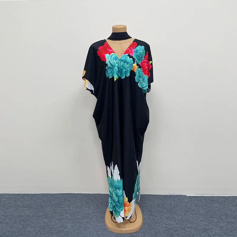 Elegant African dress for women featuring traditional dashiki Ankara fabric, long gown style with vibrant patterns and flowing design.