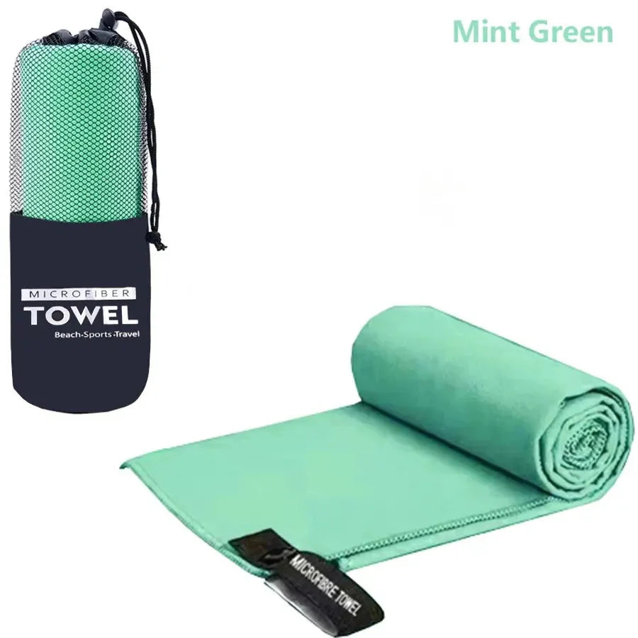 SHOWLU quick-dry microfiber sports towel for gym, yoga, and camping, shown folded with soft texture and compact size.