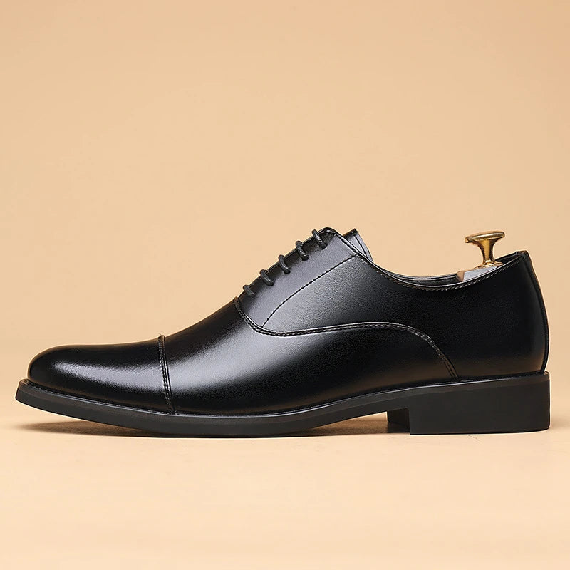 Men's black genuine leather dress shoes with cap toe, lace-up design, suitable for business, formal, wedding, and daily wear.