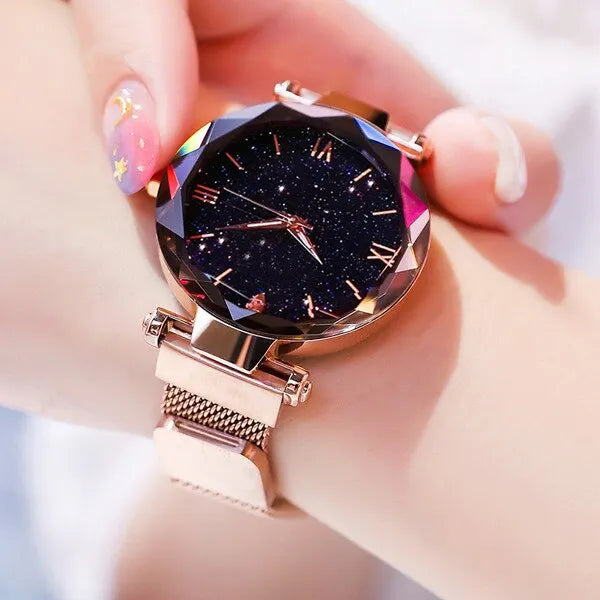 Women's fashion starry sky quartz watch by Showlu with magnet buckle mesh band and diamond accents for elegant dress wear.
