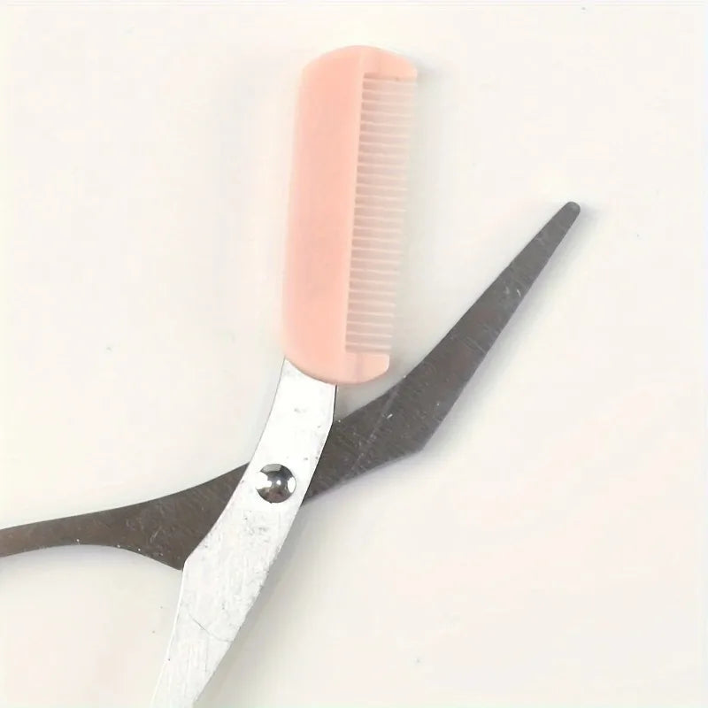 Pink stainless steel eyebrow trimming scissors with built-in comb for precise grooming and shaping of eyebrows.