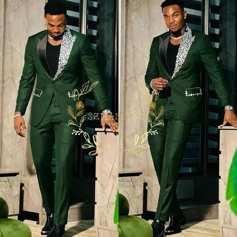 Black men's slim fit suit with single-breasted blazer and pants, featuring peak lapel and high-quality crystal details.