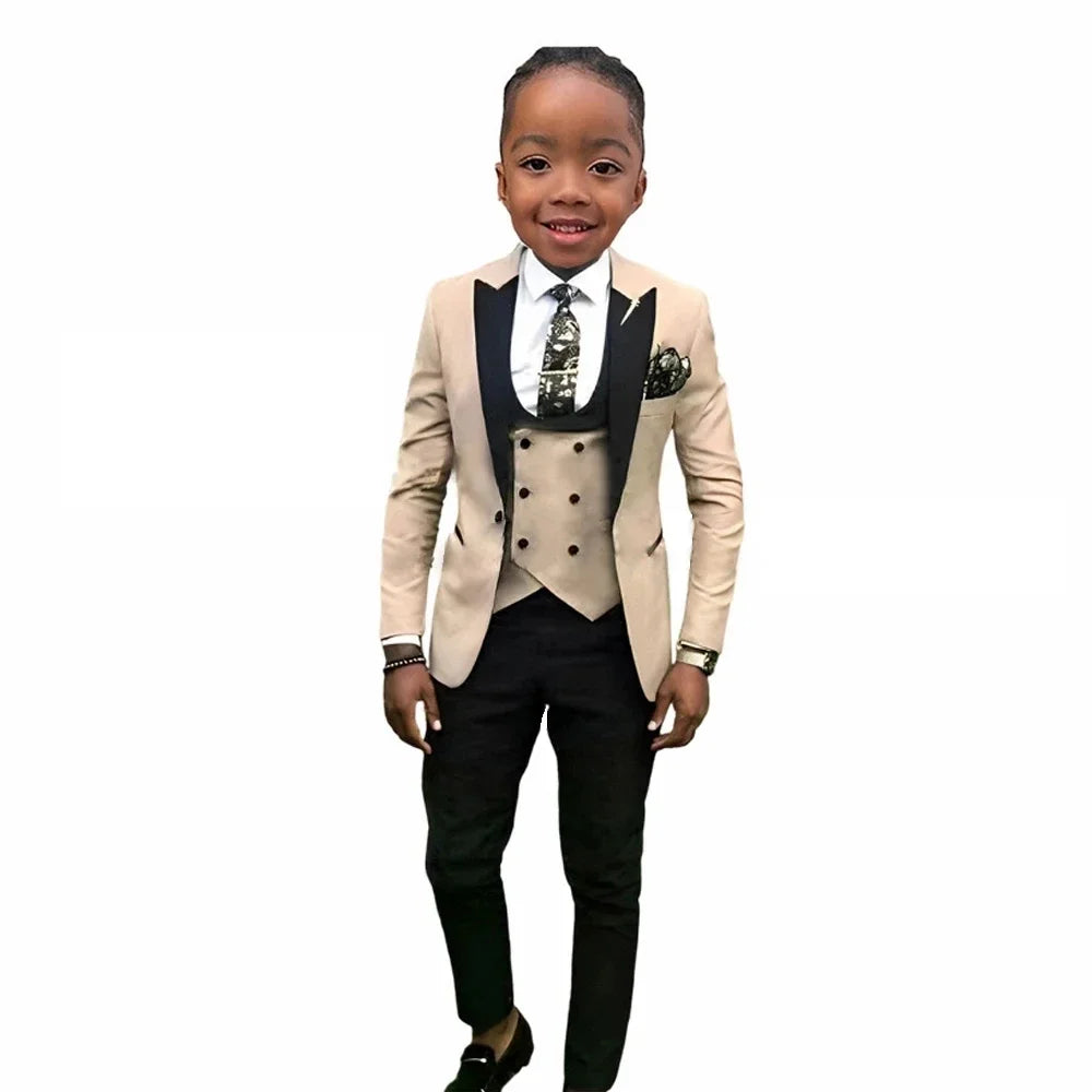 SHOWLU Boys 3-Piece Formal Suit Set with cotton peak lapel tuxedo, ideal for weddings and formal occasions.