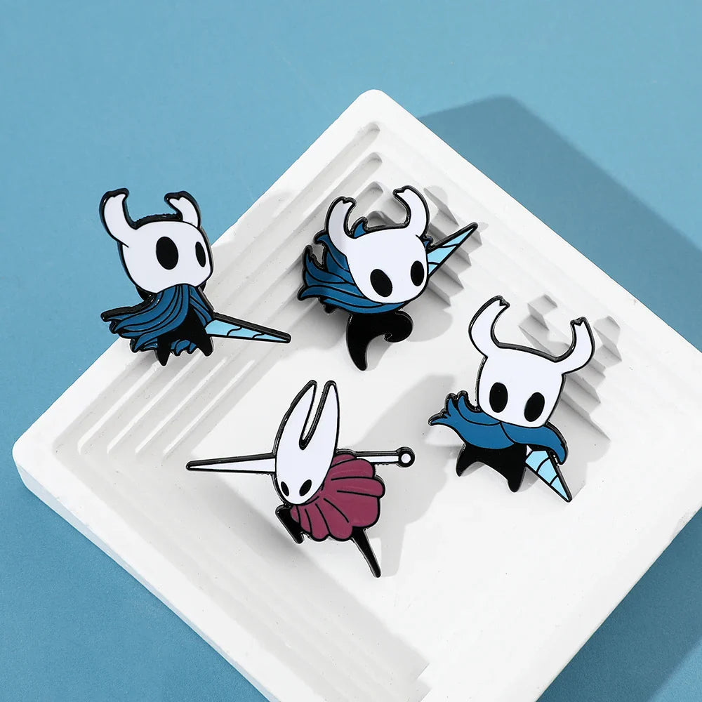 Hollow Knight enamel pin by Hot Toys featuring zinc alloy metal, game badge brooch with detailed design and vibrant colors.