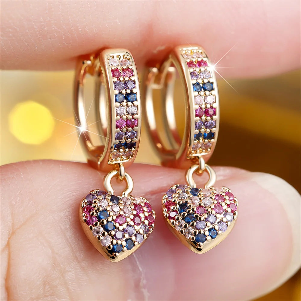 Gold plated Showlu Rainbow Zircon Heart Hoop Earrings with sparkling crystal accents, stylish and elegant jewelry for women.