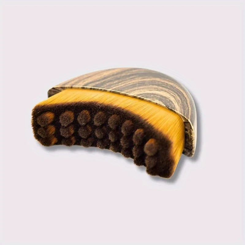 Lymphatic contour face brush by Stone's Store with soft bristles for facial massage and lymphatic drainage.