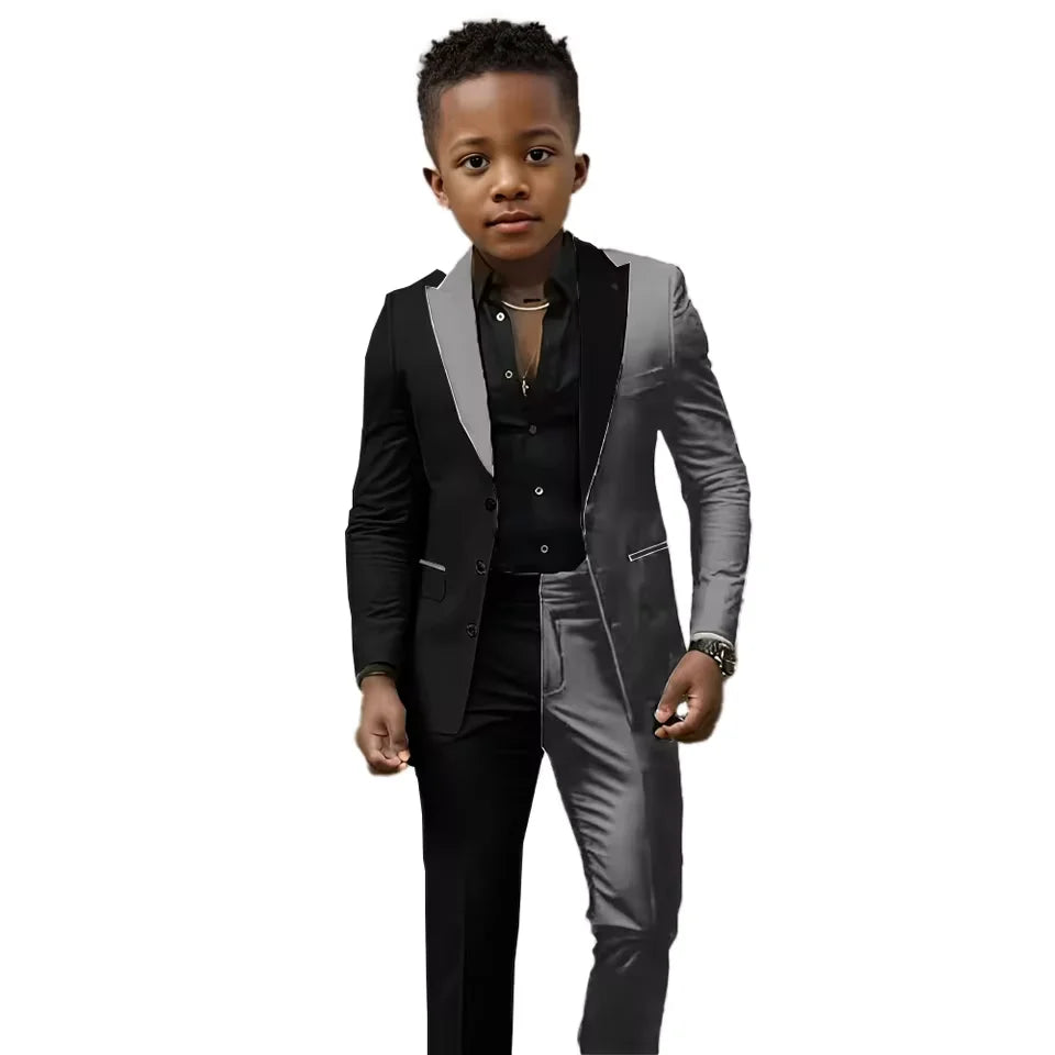 Black and white spliced boys wedding suit 2-piece tuxedo, slim fit jacket and pants, perfect for Easter, prom, or birthday.