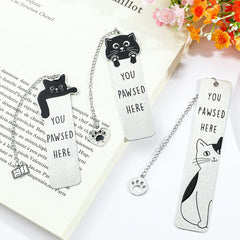 Three stainless steel bookmarks featuring cat designs and the text You Pawsed Here.