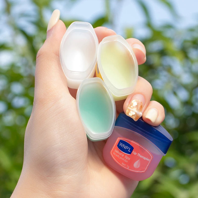 Showlu Fashion Store natural lip balm and moisturizing lip mask for dry lips, with nourishing and healing ingredients in a sleek container.