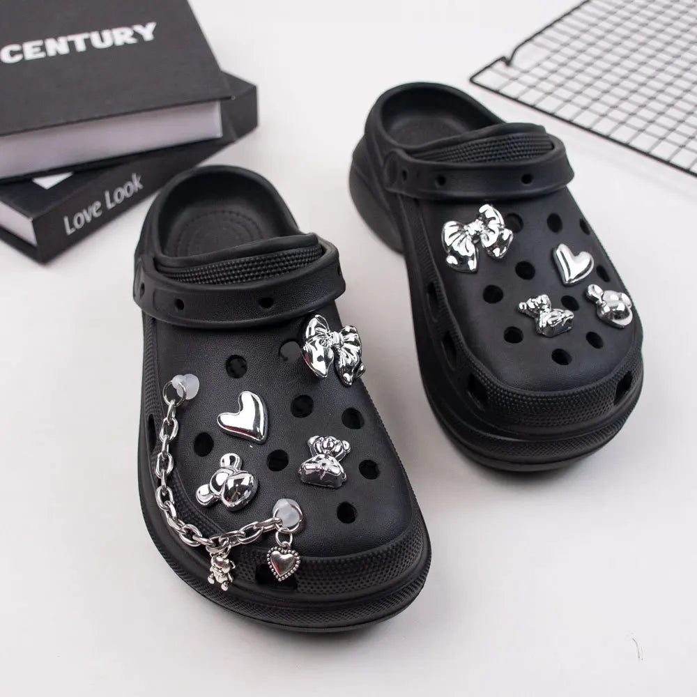 Colorful acrylic shoe charms featuring butterfly, cartoon bear, and decorative buckles for kids' shoes and party accessories.
