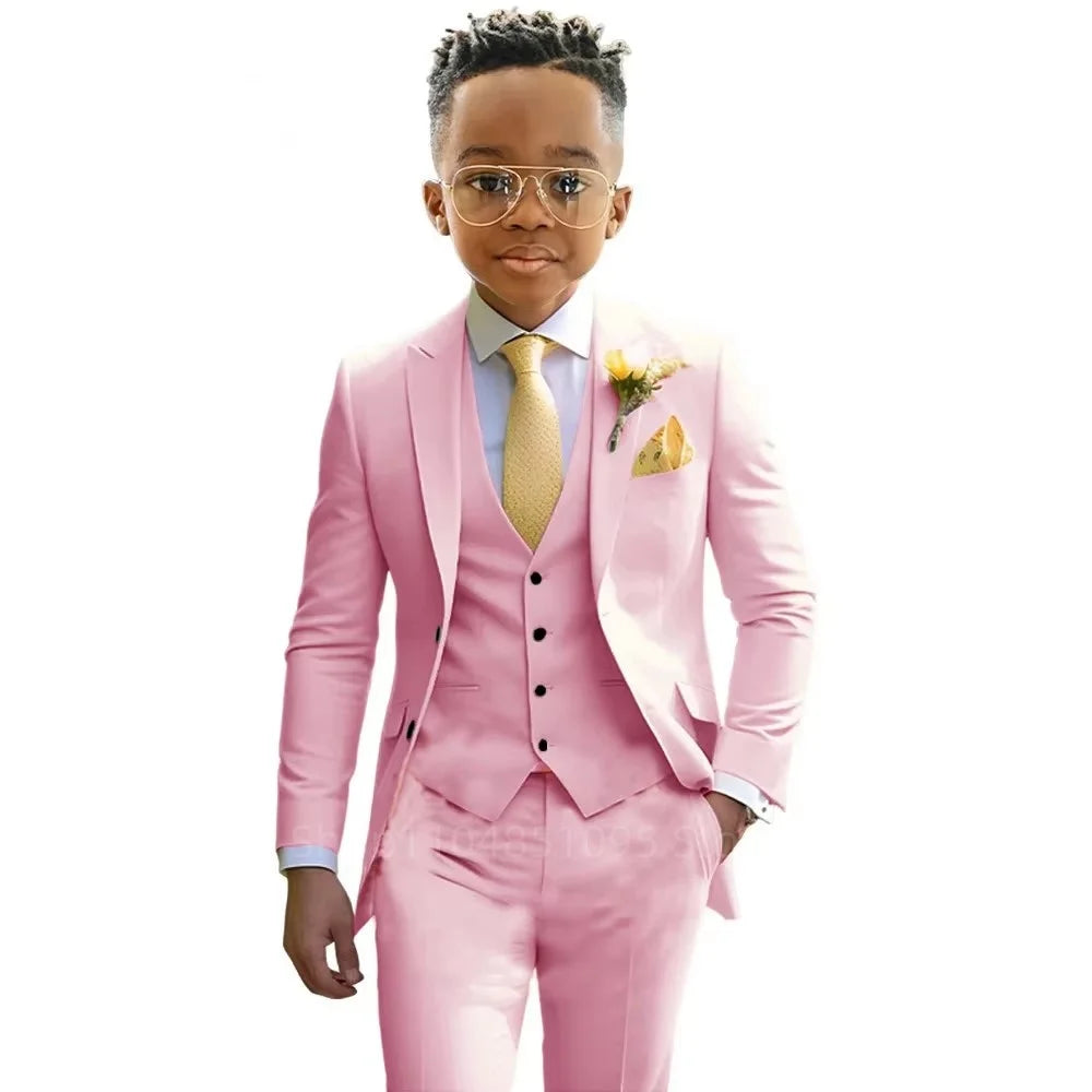 Boy wearing a formal 3-piece suit by 1170uf-he, ideal for weddings and parties, featuring a jacket, vest, and trousers in the image.