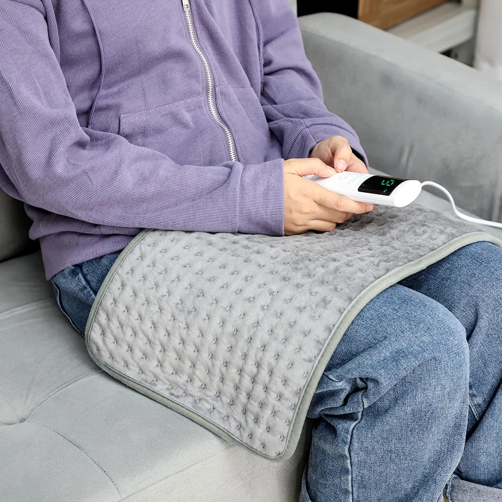Showlu Smart General electric heating pad with adjustable temperature and timer, plush warm mat for comfort and relaxation.
