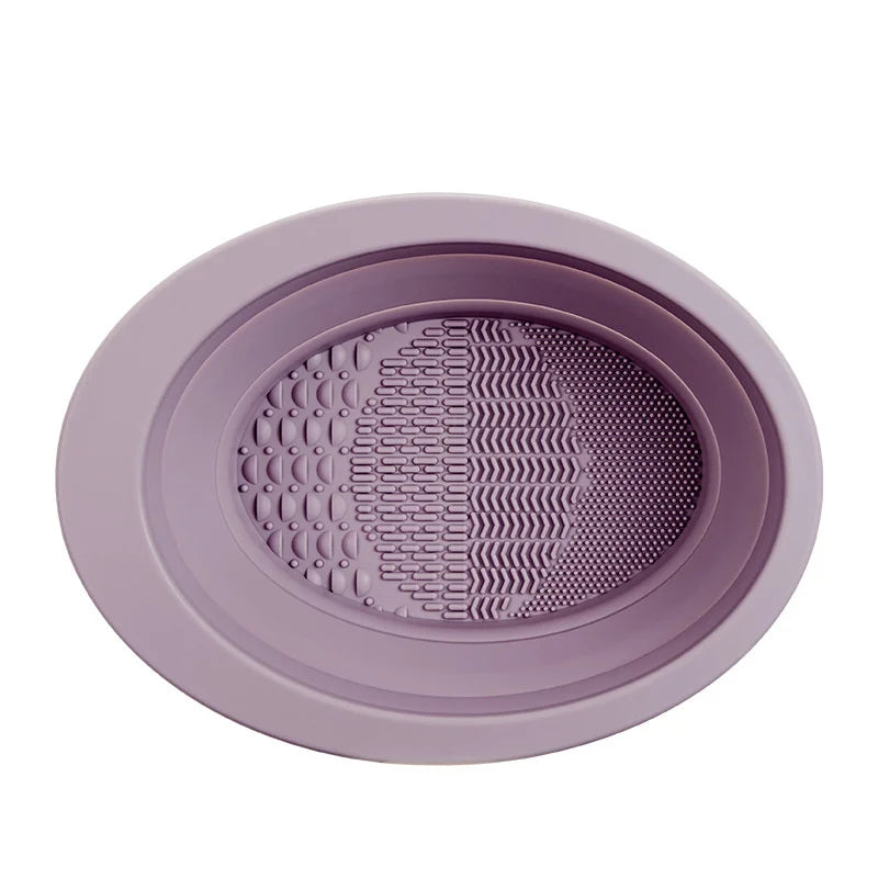 Silicone makeup brush cleaner pad by Showlu Smart General with textured surface for easy makeup brush cleaning.