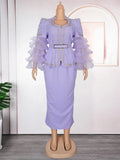 Elegant African beaded evening gown for women, vintage slim maxi dress by Showlu Fashion with intricate beadwork and flowing design.