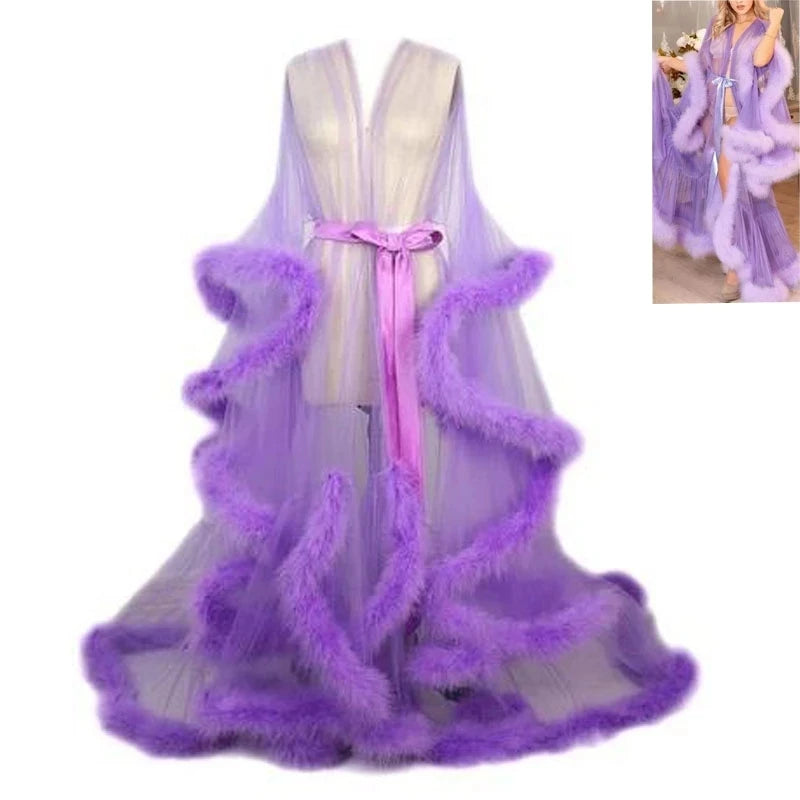 Deep V-neck lace maternity dress by Showlu Fashion with tulle, long sleeves, feather accents, ideal for photoshoots.