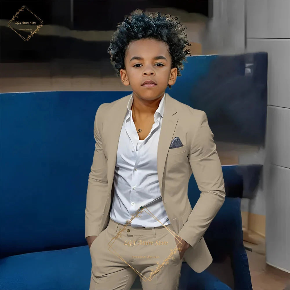 Boy wearing SHOWLU FASHION STORE LEOSOXS orange slim fit 2-piece suit with single-breasted twill jacket and matching pants.