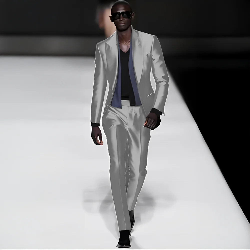Elegant men's satin 2-piece suit with peak lapel blazer and matching pants, suitable for weddings, tuxedos, or dinner parties.