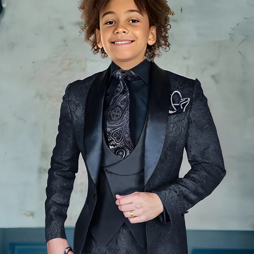Burgundy jacquard boys' 3-piece suit featuring jacket, pants, and vest, ideal for formal weddings and special occasions.