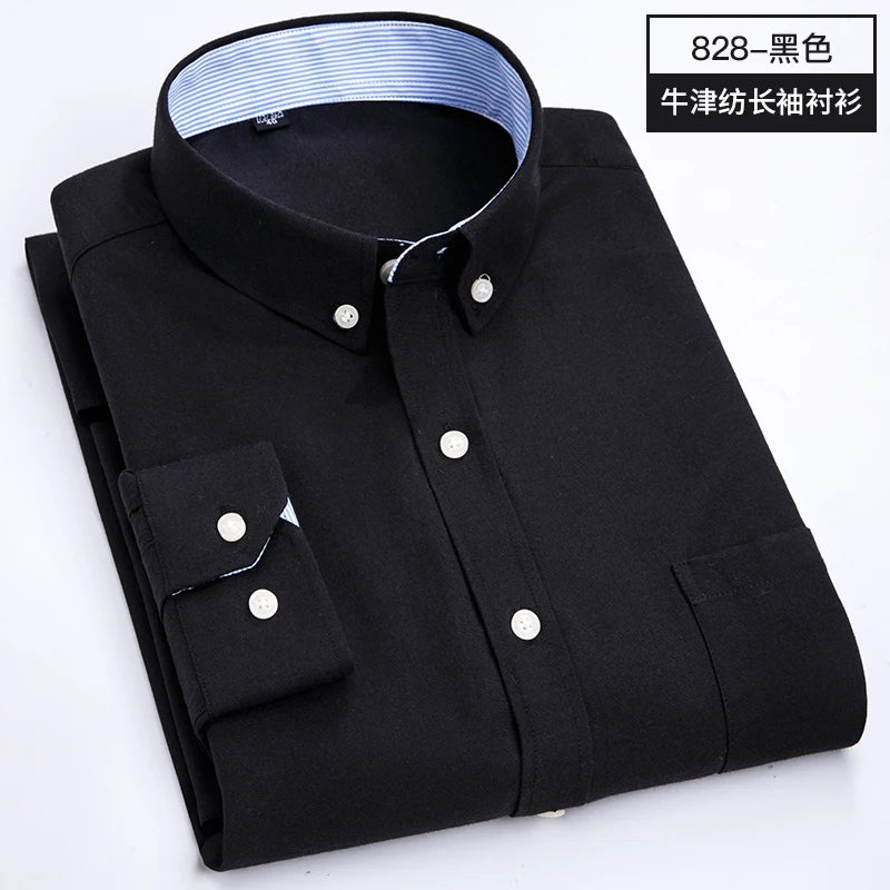 Showlu men's slim fit oxford shirt with long sleeves, non-iron casual top in classic blue fabric, neatly pressed and hanging on a hanger.