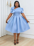 Plus size AOMEI women's pleated fit and flare prom dress with bowtie, shown in black, perfect for party or special occasions.