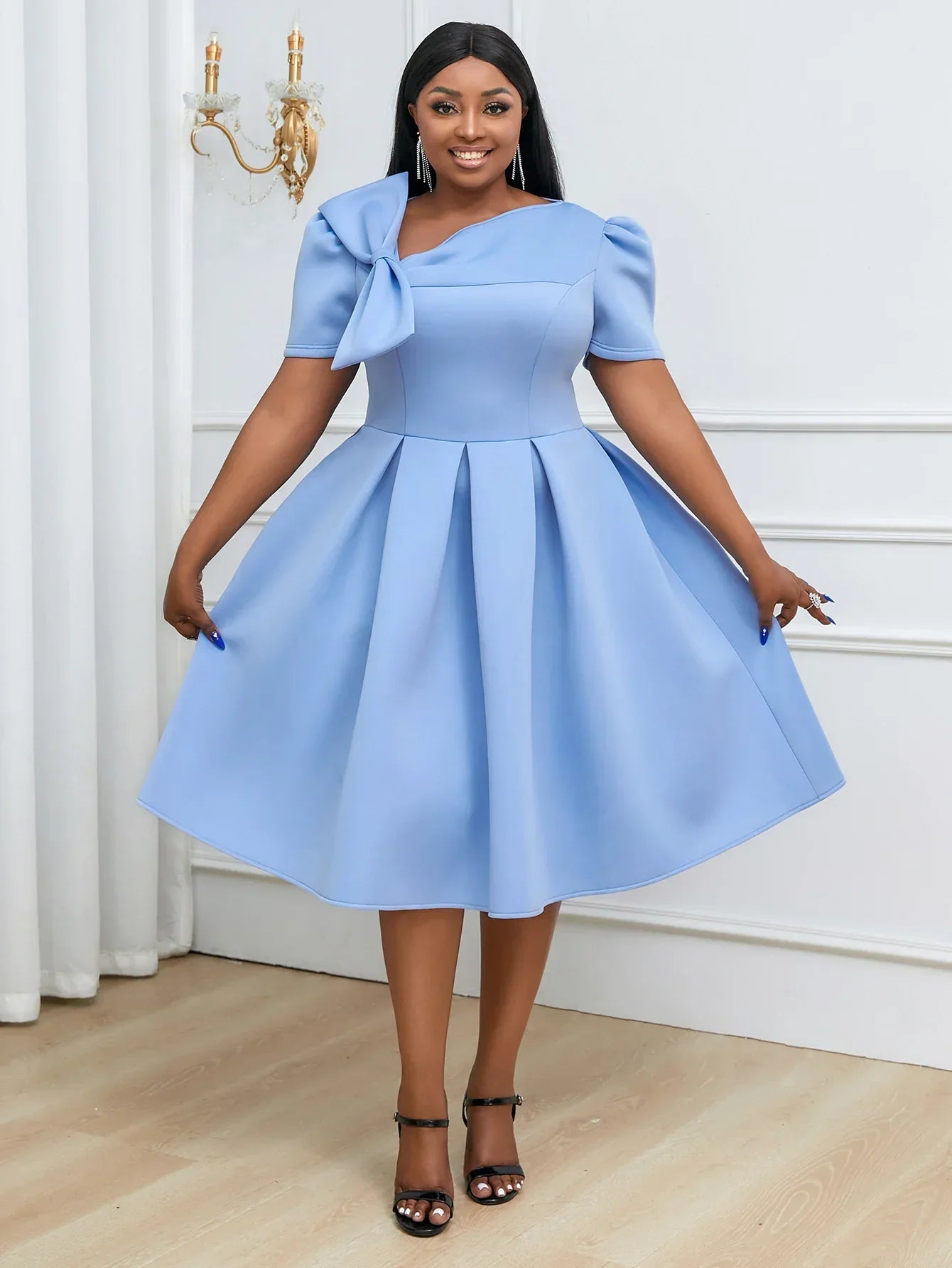 Plus size AOMEI women's pleated fit and flare prom dress with bowtie, shown in black, perfect for party or special occasions.