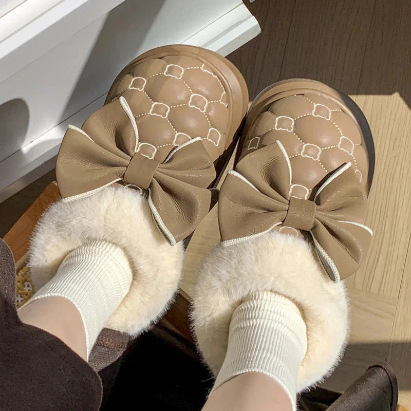 Rimocy Women's Snow Boots by SHOWLU FASHION STORE featuring fluffy butterfly platform ankle design with cozy winter insulation.