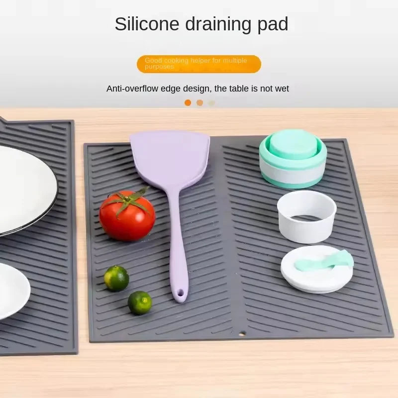 Showlu Smart General silicone sink protector mat with drainage holes, designed to protect sink surfaces and catch debris.