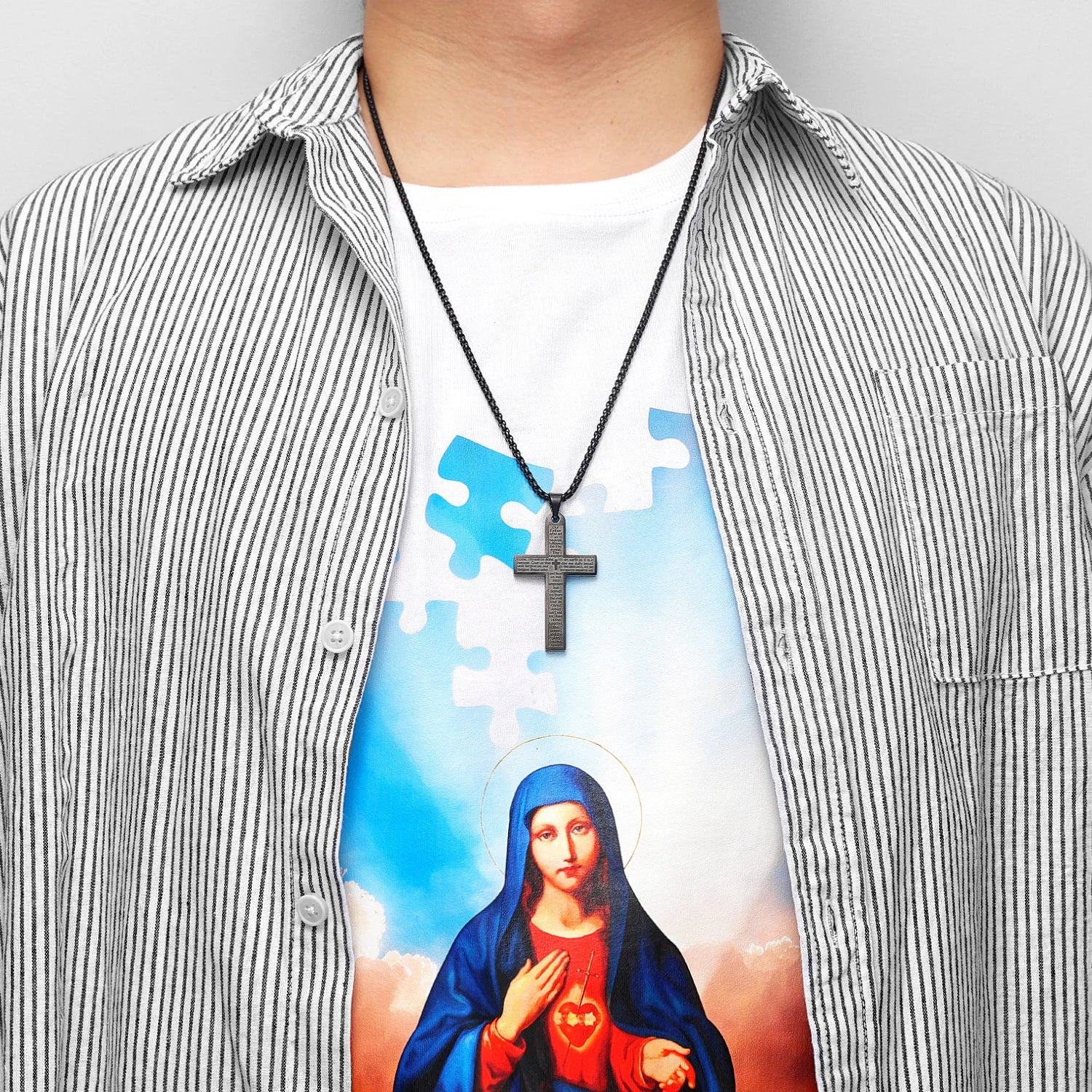 Stainless steel cross pendant necklace from Metal Town, showing a punk-inspired religious jewelry design with intricate details.