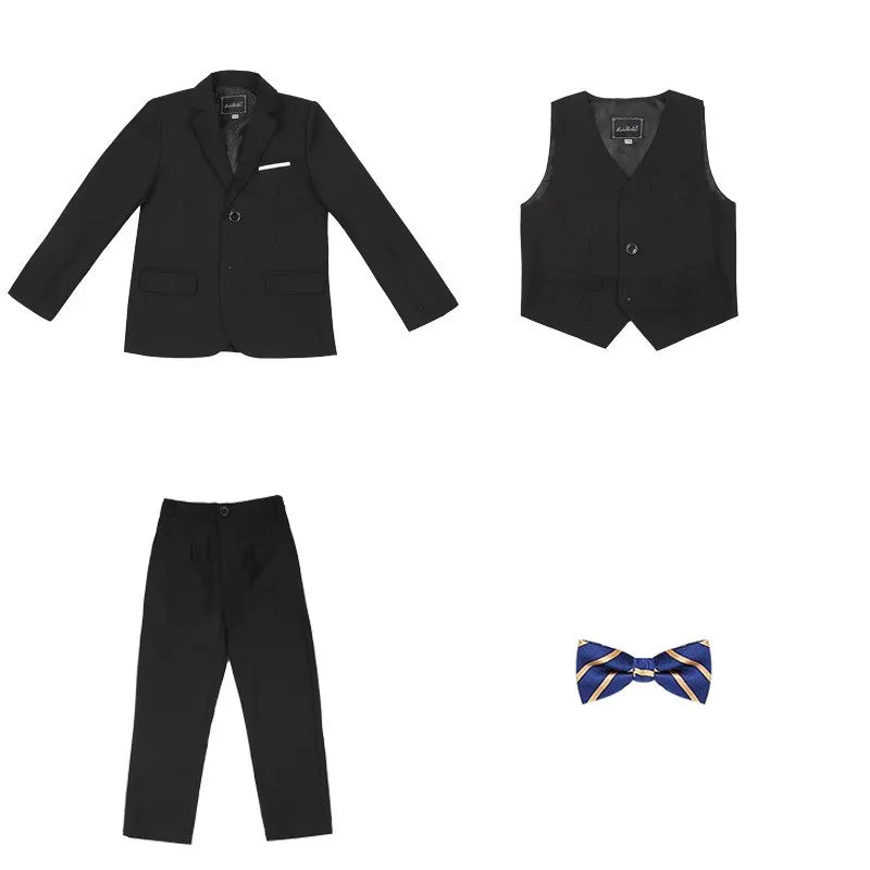 Dark green boys formal wedding suit and tuxedo set by SHOWLU FASHION STORE, includes jacket, pants, vest, and shirt.