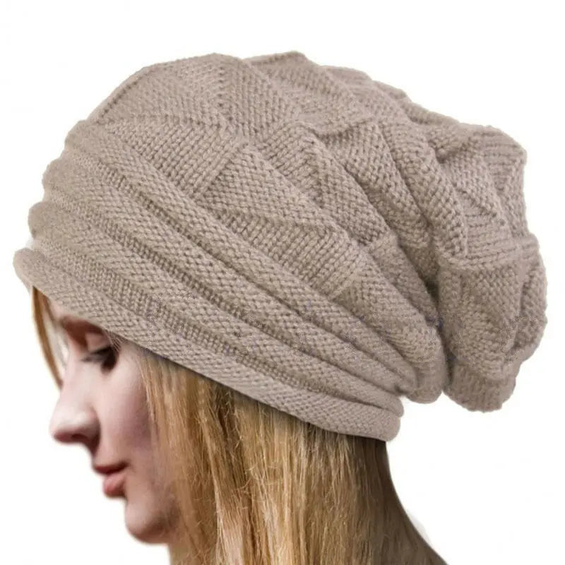 Winter knitted women's slouchy beanie hat with warm wool, ideal for outdoor snow skiing and cold weather conditions.
