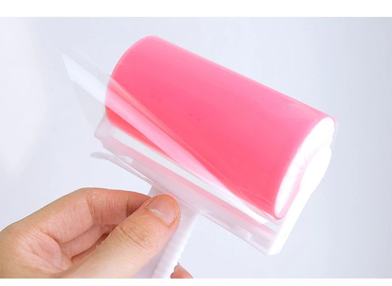 Showlu Smart General Pet Hair Roller Pro removing pet hair from sofa and clothing with its sticky, reusable roller.