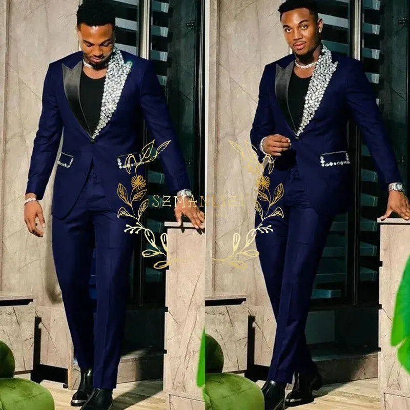 Black men's slim fit suit with single-breasted blazer and matching pants, featuring peak lapel, ideal for prom or formal events.