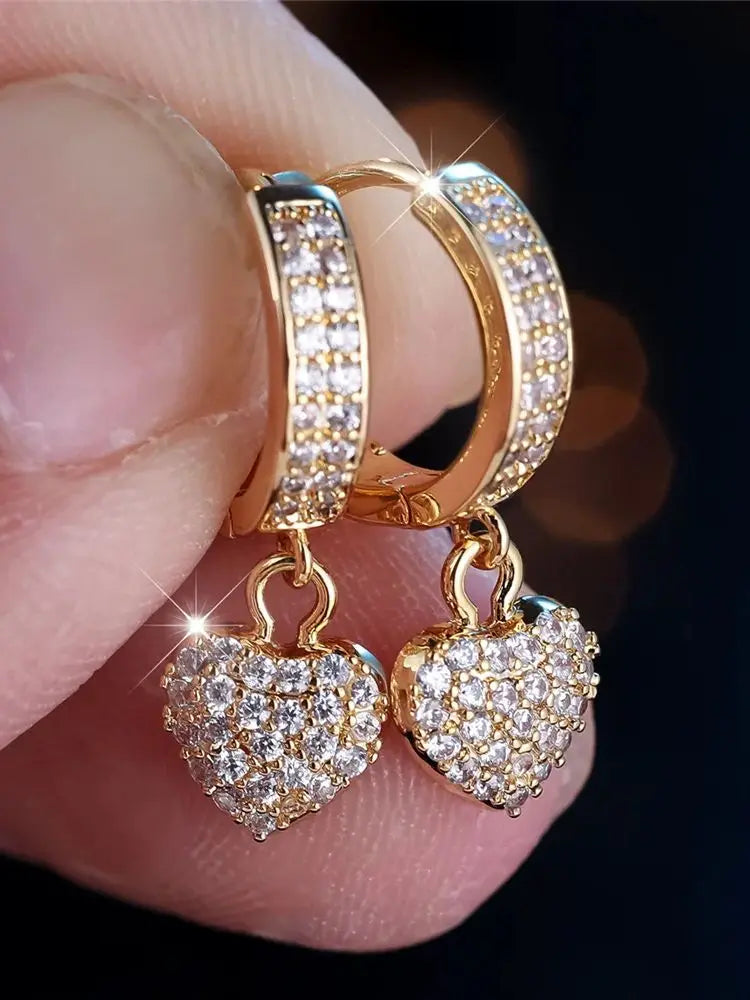 Gold plated Showlu Rainbow Zircon Heart Hoop Earrings with sparkling crystals, stylish and elegant jewelry for women.