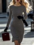 Showlu plaid midi dress featuring a slim fit, long sleeves, and a front slit, perfect for stylish and elegant occasions.