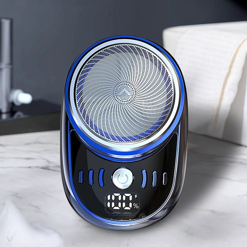 Men's mini electric travel shaver by Showlu Fashion with USB charging, digital display, rechargeable, washable beard trimmer for face grooming.
