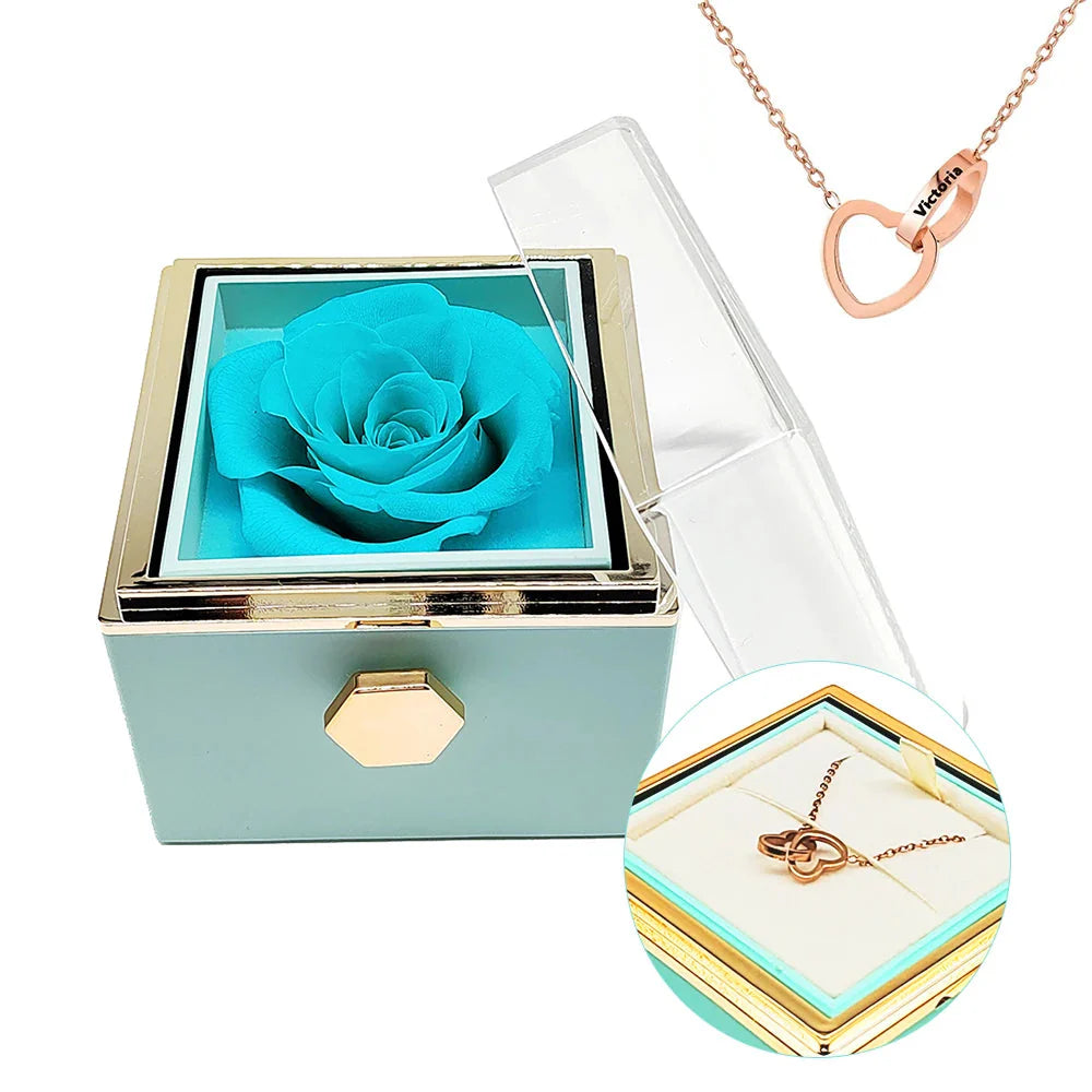 Engraved interlocking heart necklace and eternal rose box from Showlu Fashion, displayed in an elegant jewelry presentation.