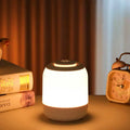 Showlu Smart General LED rechargeable table lamp with sleek design and adjustable brightness on a modern desk.