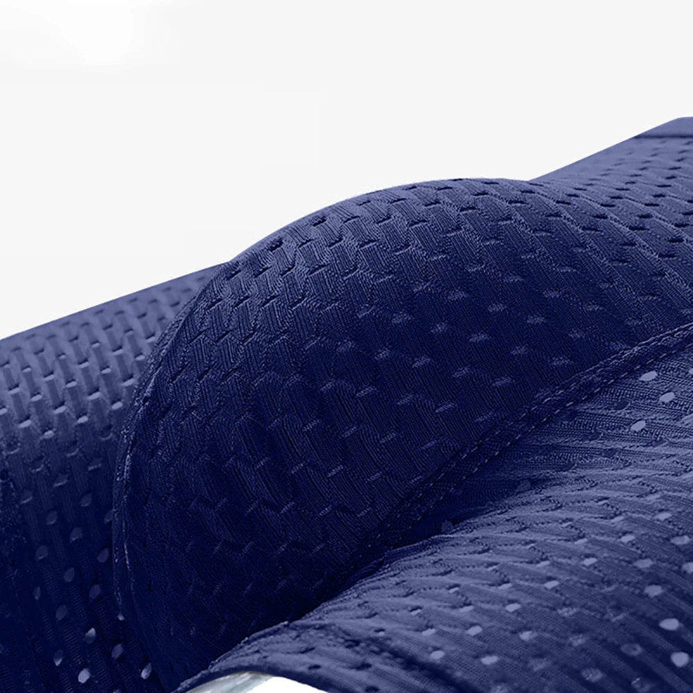 Showlu Men's Ice Silk Boxer Shorts with breathable mesh polyester fabric, comfortable men's underwear featuring a stylish design.