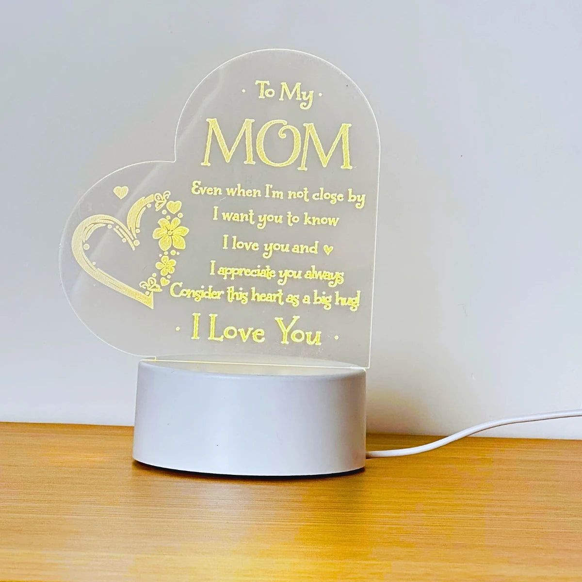 Showlu Fashion Heart Carving Night Light emitting a soft glow, ideal as a birthday gift for mom, with a heart-shaped design.