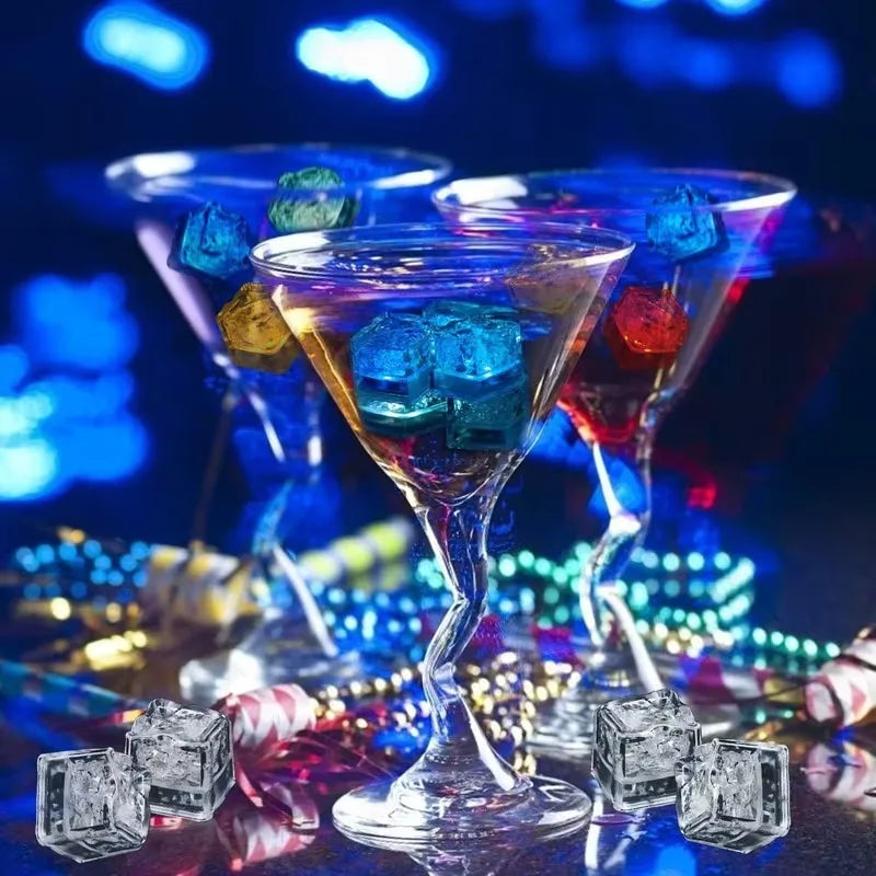 Set of 6 waterproof LED glowing ice cube lights from Showlu Smart General, liquid sensor drink mood cubes for parties and decor.