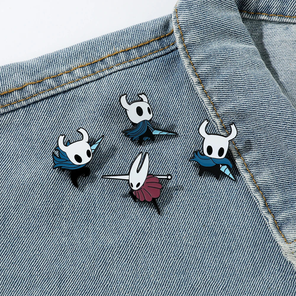 Hot Toys Hollow Knight enamel pin featuring a zinc alloy metal game brooch badge with detailed design.
