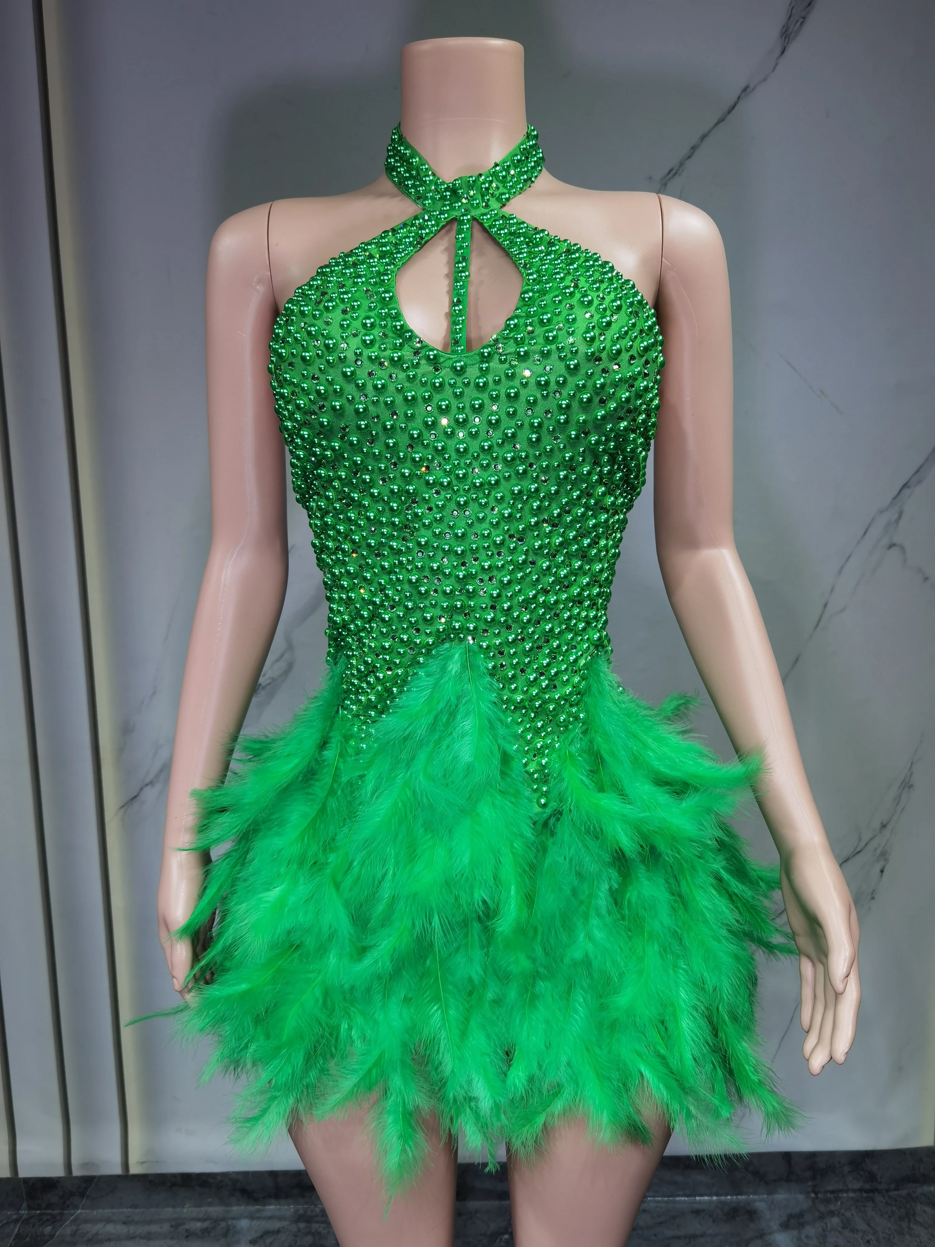 Sexy Latin dance dress by Showlu Fashion Store featuring airy hollow design and feather skirt hanging neck for stylish movement.