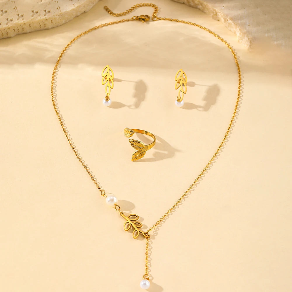 Stainless steel jewelry set with leaf and pearl earrings, necklace, and adjustable leaf ring for women, new stylish design