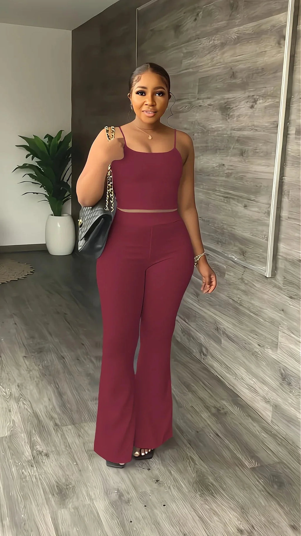 Stefion women's 2-piece summer set with sleeveless crop top and long pants, stylish and comfortable for warm weather.