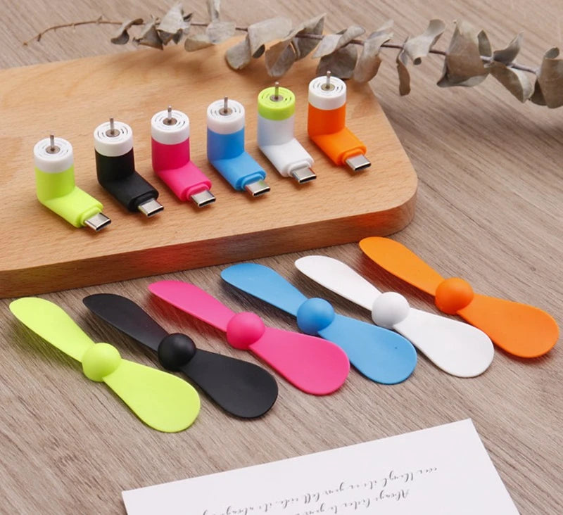 Showlu Smart General USB Mini Fan with portable design and adjustable blades, ideal for personal cooling on the go.
