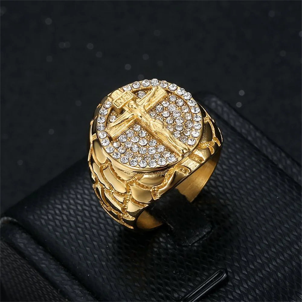 Men's iced out Jesus cross ring in 18k gold plated stainless steel with intricate design and sparkling gemstone accents.