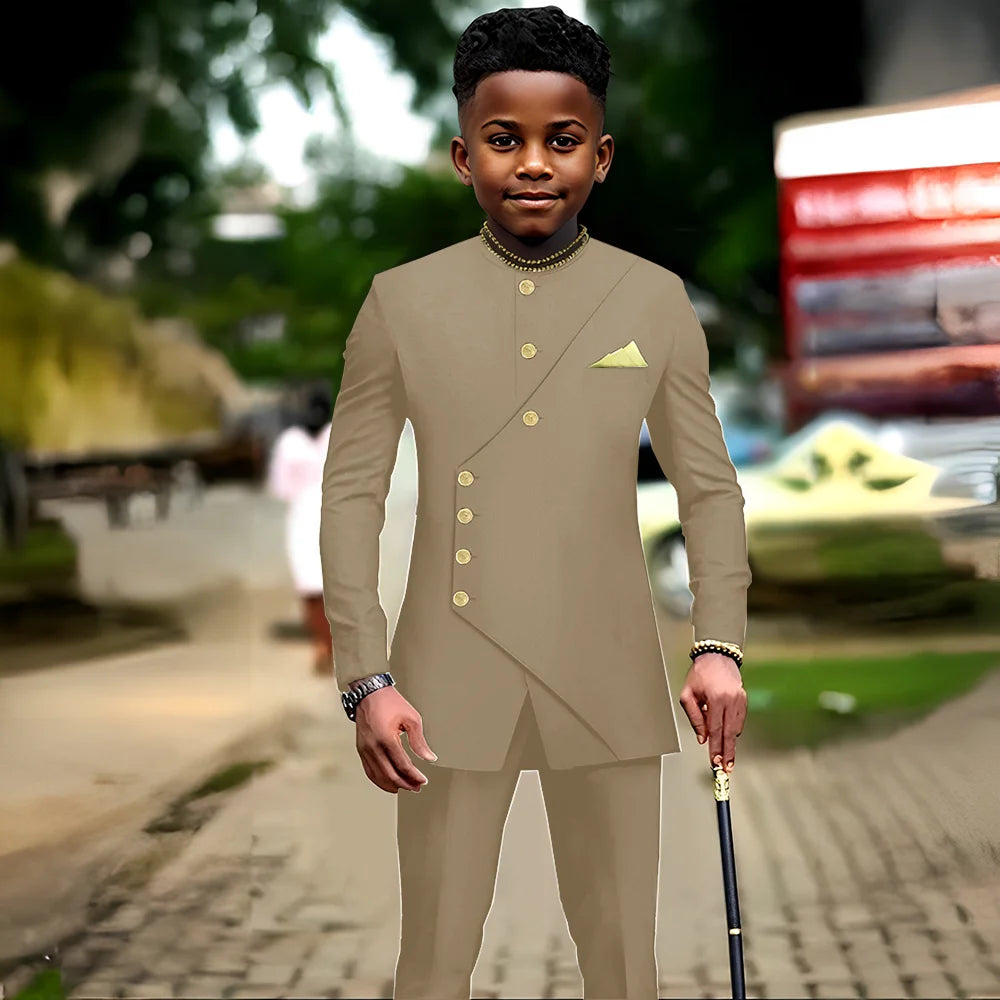 African boys' tuxedo suit with jacket and pants, stylish party and wedding outfit for kids ages 2 to 16 by Showlu Fashion Store.